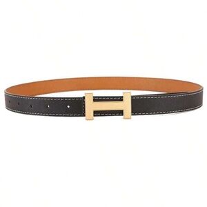 Size 110- women’s Reversible Black/Tan Leather Belt with Gold H Buckle